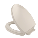 TOTO SoftClose Non Slamming, Slow Close Round Toilet Seat and Lid, Bone SS113